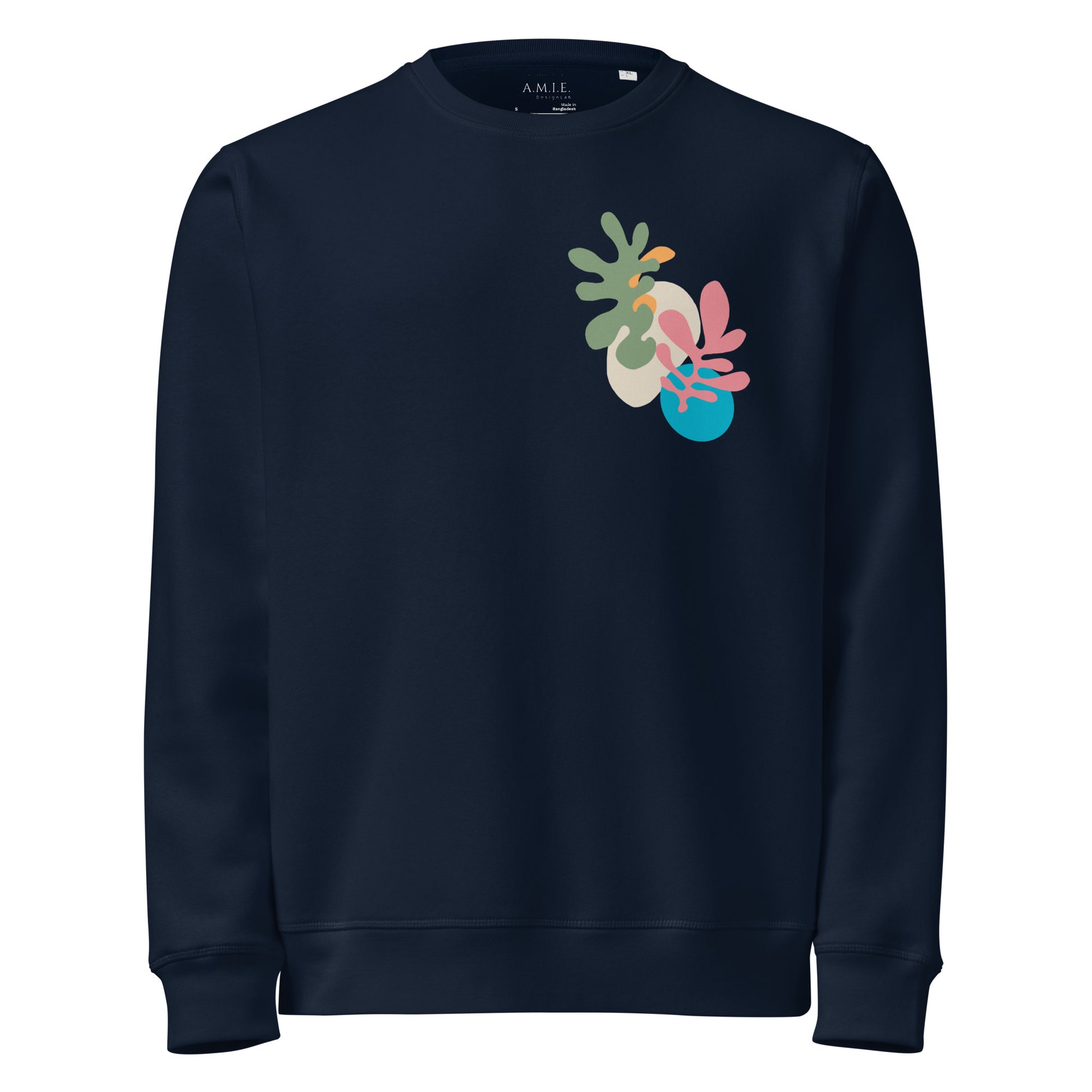 French Navy sweatshirt with abstract botanical chest design in soft green, cream, pink, and teal accents.