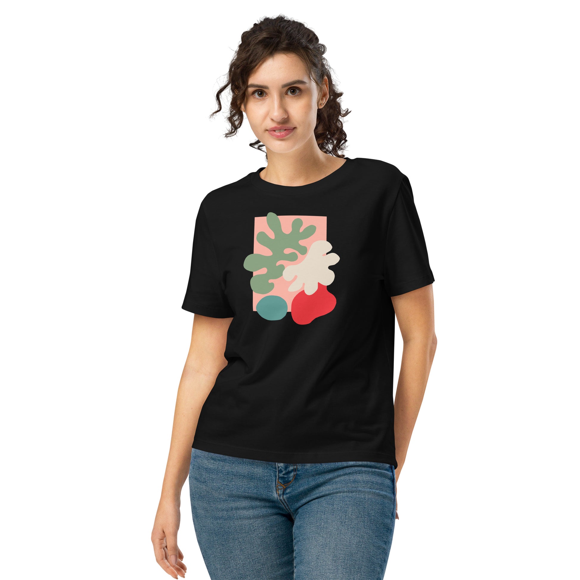 Woman wearing a organic black t-shirt with abstract design