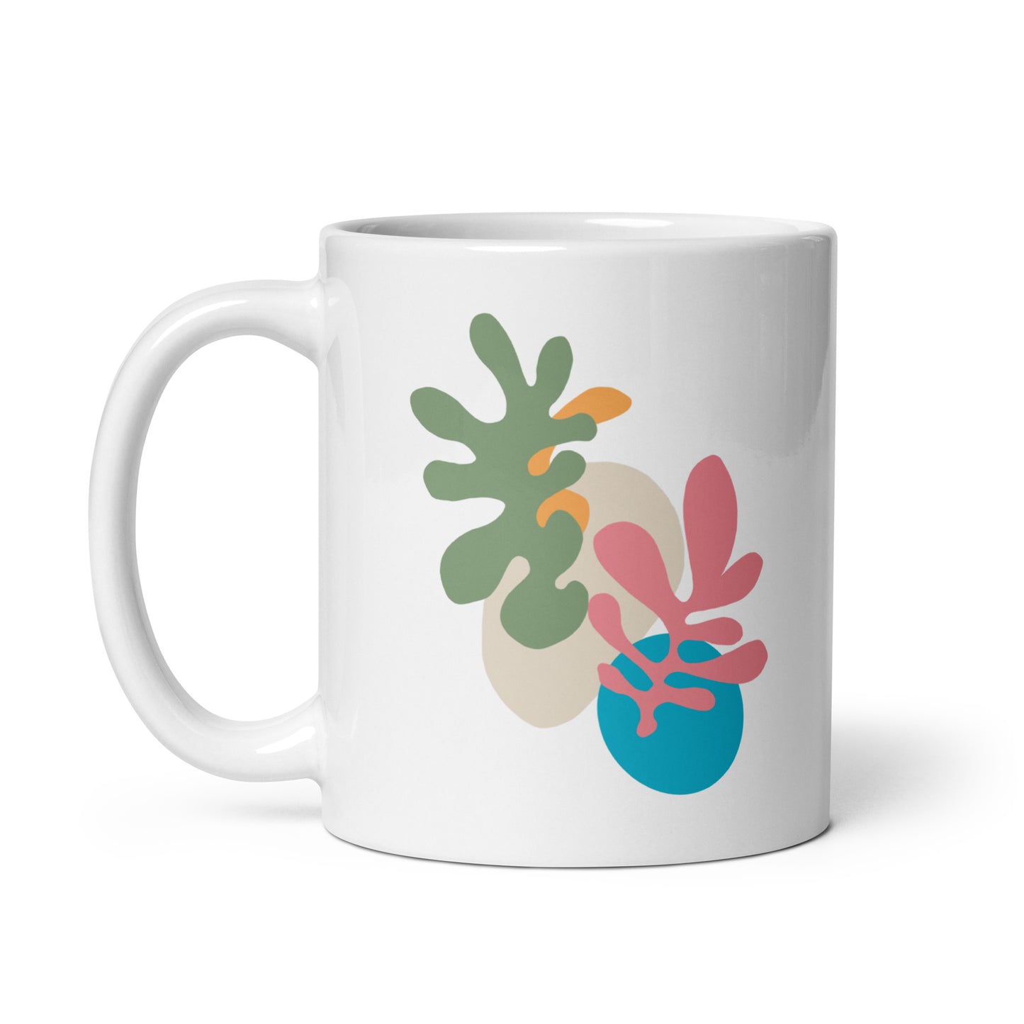 White mug featuring dual-tone abstract botanical design, stylish modern drinkware. Side view 1