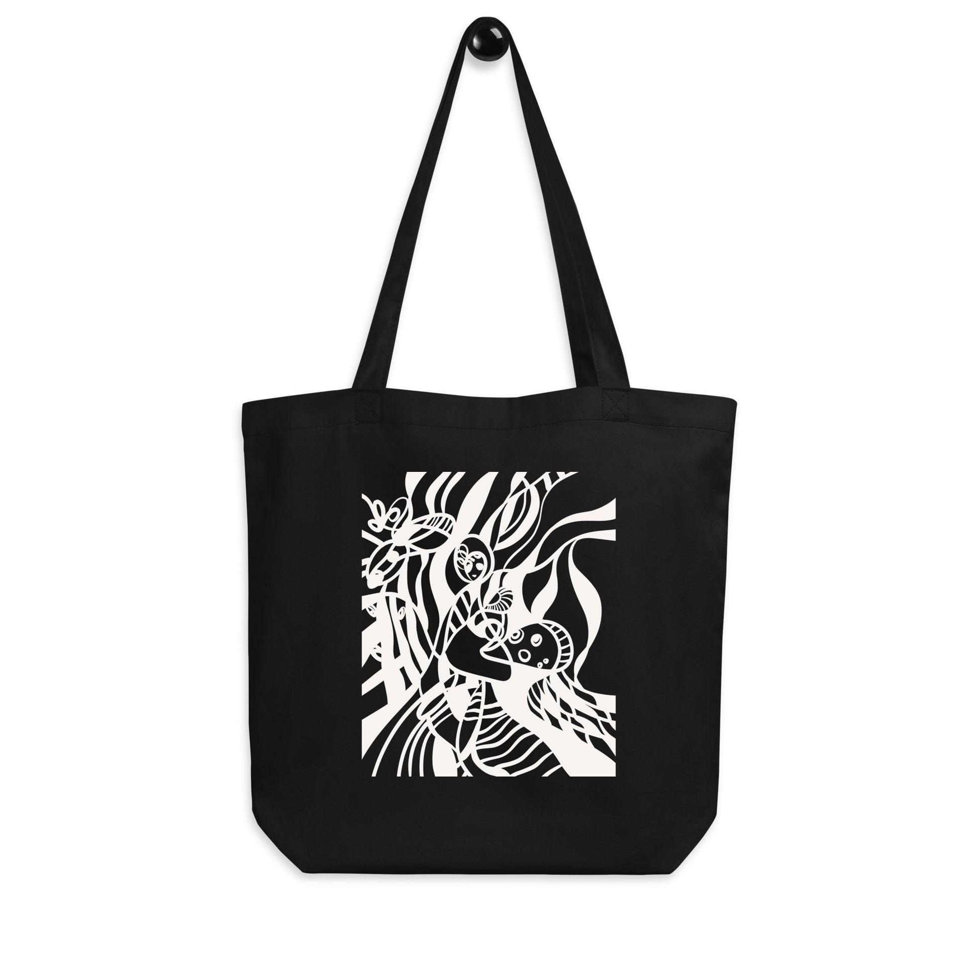 Eco tote bag with black and white abstract line art print.