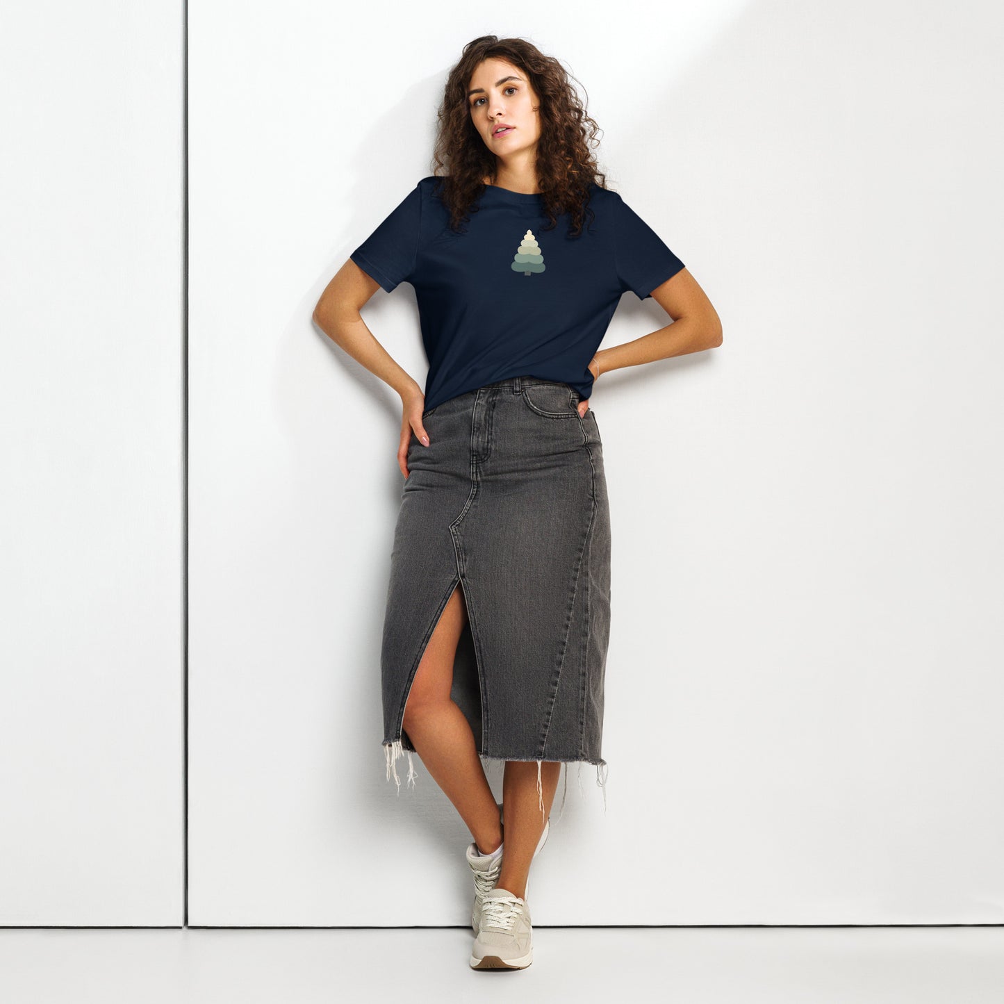 Women’s organic t-shirt with minimalist evergreen tree design on model