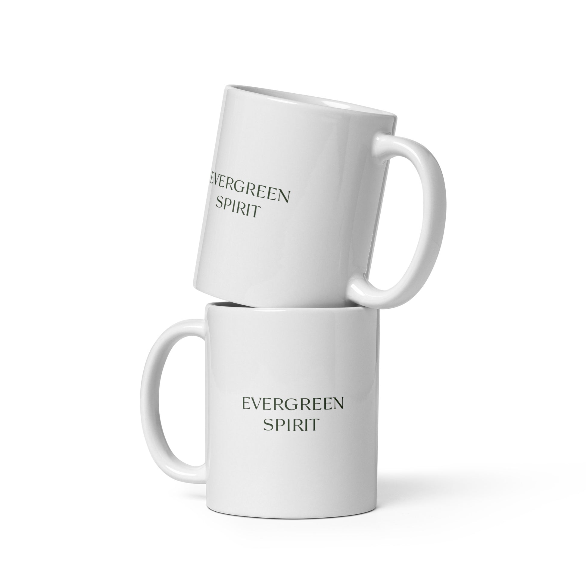 White ceramic mug with the words ‘Evergreen Spirit’ in minimalist serif typography.