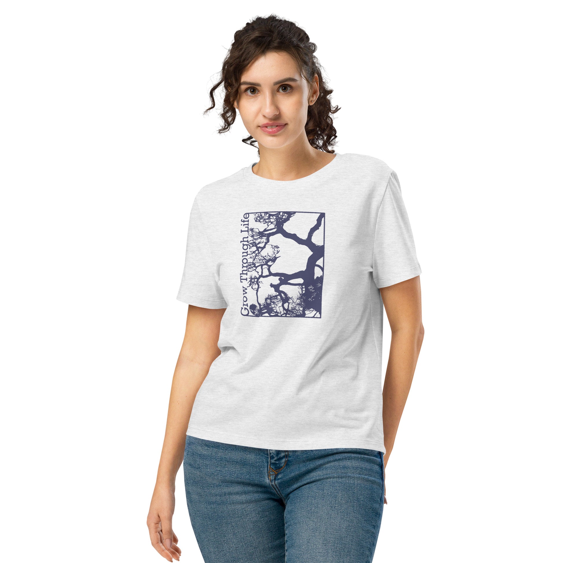 Woman wearing a white t-shirt with a graphic design on a white background