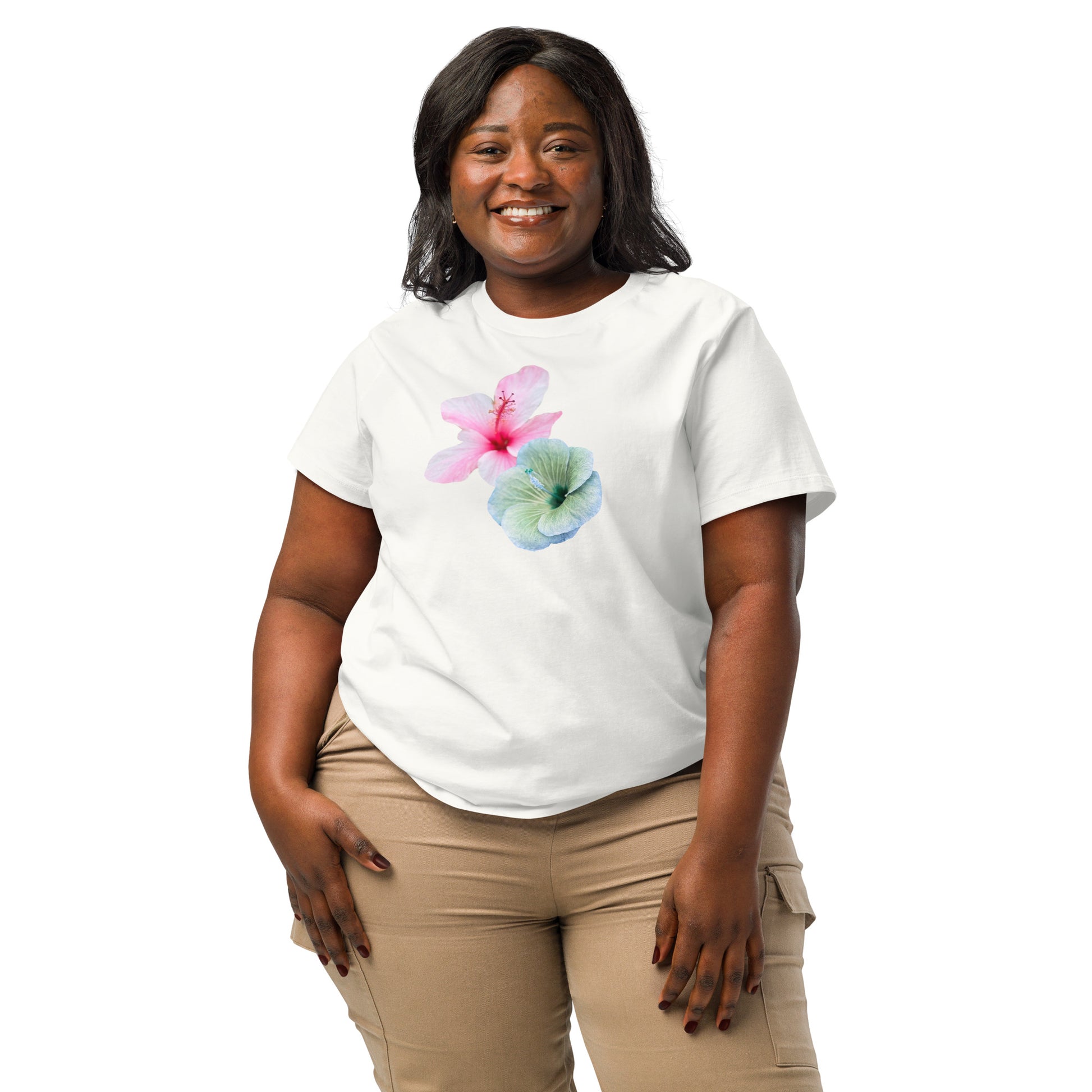 Off White organic cotton t-shirt with vibrant pink and aqua hibiscus flower design on model