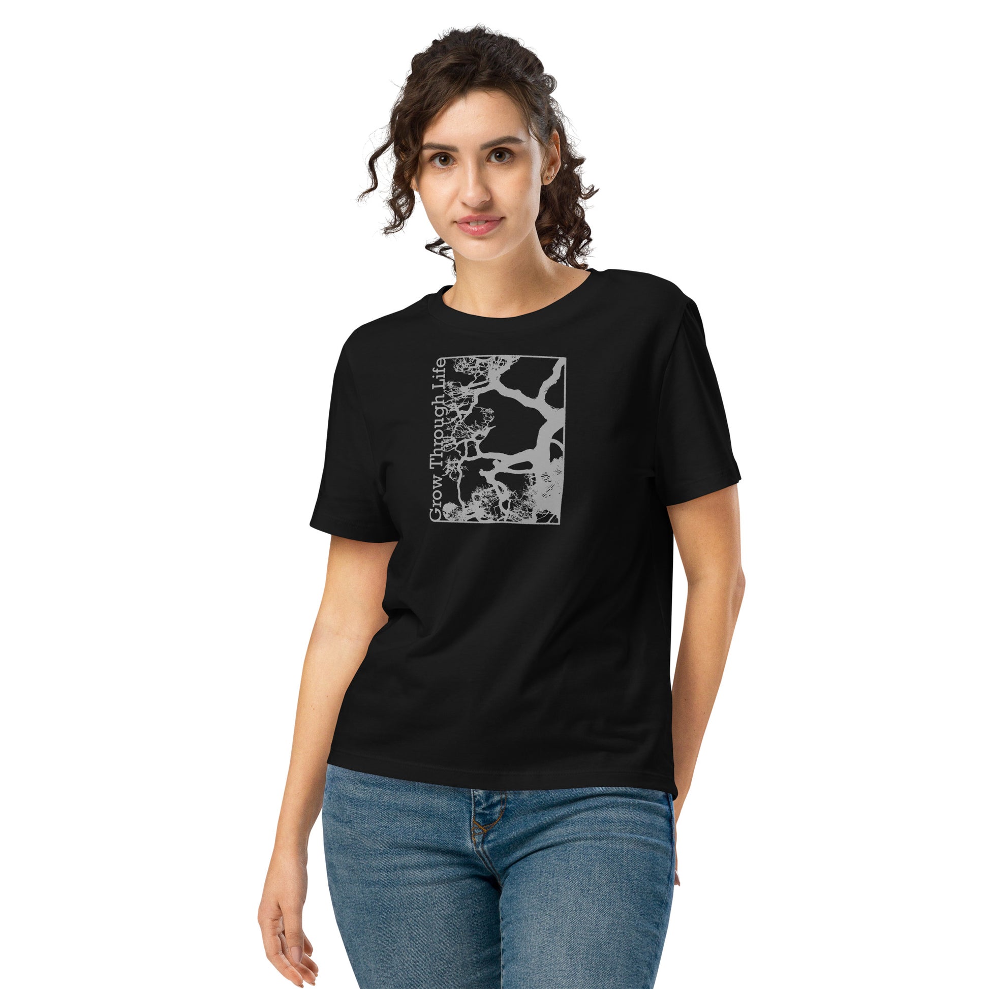 Woman wearing a black t-shirt with Grow Through Life Tree graphic