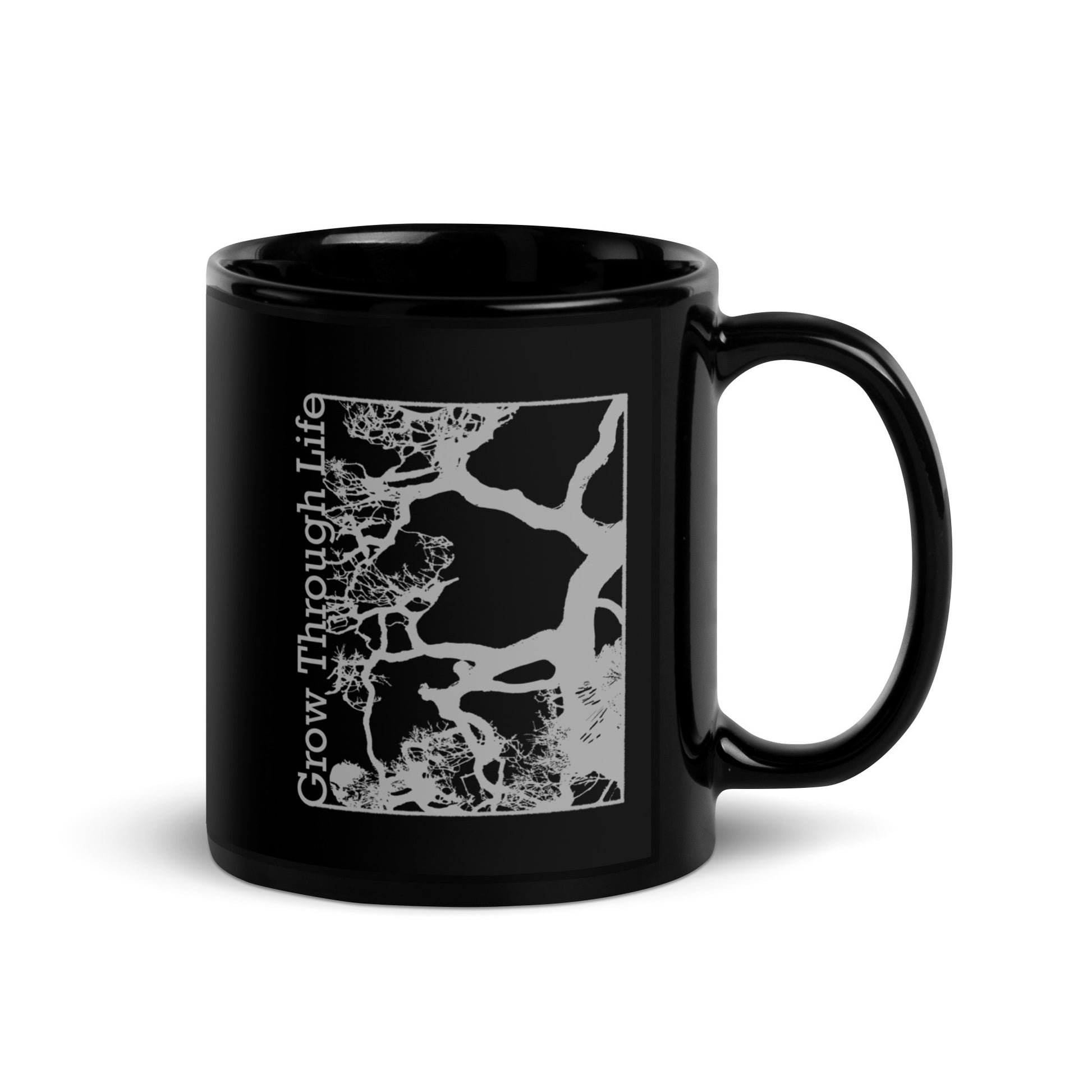Black mug with light gray symbolic tree design, inspirational nature-themed drinkware. View 2